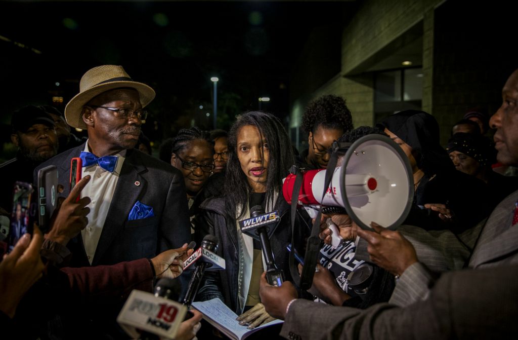 First Place, Photographer of the Year - Large Market - Meg Vogel / The Cincinnati EnquirerFormer juvenile court judge Tracie Hunter speaks to local media and her supporters after her release from the Hamilton County Justice Center in downtown Cincinnati on Saturday, October 5, 2019 at 5 a.m. Hunter was convicted of a felony charge related to giving confidential documents to her brother, a juvenile court employee who was in the process of being fired. Hunter served 75 days in jail. 