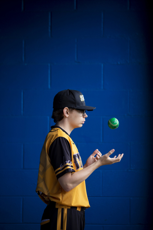 First Place, Photographer of the Year - Large Market - Meg Vogel / The Cincinnati EnquirerScott Bine juggles a baseball between innings at Summit Country Day School Athletic Complex in Columbia Township on Friday, April 26, 2019. 