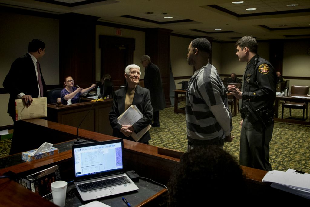 First Place, Photographer of the Year - Large Market - Meg Vogel / The Cincinnati EnquirerSr. Rose Ann Fleming represents her client on Monday, February 25, 2019 at the Hamilton County Courthouse in downtown Cincinnati. Sr. Fleming is part of the Volunteer Lawyers Project. She spends her free time working on briefs and defending people for free. 