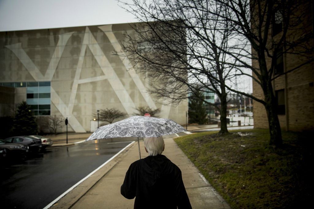 First Place, Photographer of the Year - Large Market - Meg Vogel / The Cincinnati EnquirerSr. Rose Ann Fleming walks to her office in the Cintas Center at Xavier University after going to mass at Bellarmine Chapel Tuesday, February, 12, 2019. She wakes up everyday at 4 a.m. She prays the rosary, meditates, drinks coffee and eats breakfast before going to mass at 8 a.m.