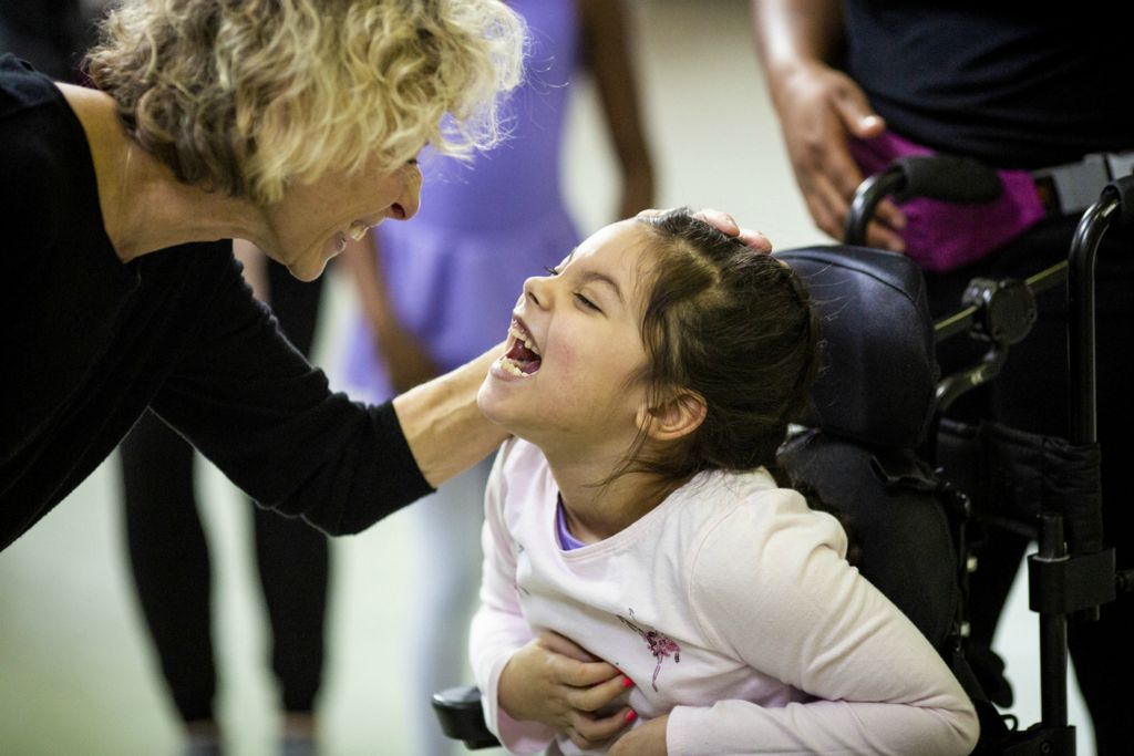 First Place, Photographer of the Year - Large Market - Meg Vogel / The Cincinnati EnquirerEvelyn Ortiz thanks Donna Grisez at the end of her Ballet Moves class at the Cincinnati Ballet on Saturday, February 2, 2019. Every class ends with the dancers taking a bow and thanking the volunteers and themselves. 