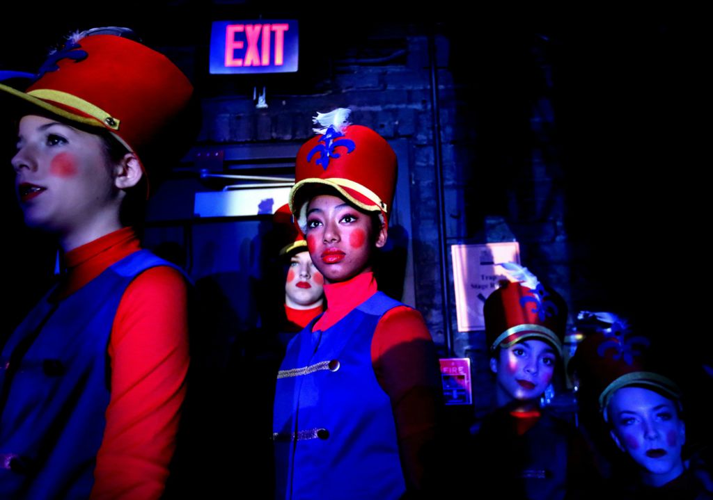 Second Place, Photographer of the Year - Large Market - Lisa DeJong / The Plain DealerCherish Hayes, 15, center, waits in the wings with her fellow ballerinas from the School of Cleveland Ballet moments before bursting onto the stage during a dress rehearsal for The Nutcracker at the Hanna Theatre. The young women are dressed as the "soldiers".