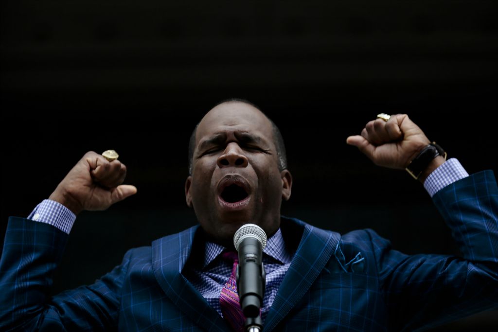 Third Place, Photographer of the Year - Large Market - Joshua A. Bickel / The Columbus DispatchPastor Davis Forbes, of the Columbus Christian Center, leads a prayer during the Ohio 7:14 Solemn Assembly of Prayer on Tuesday, June 4, 2019 at the Ohio Statehouse in Columbus, Ohio. 