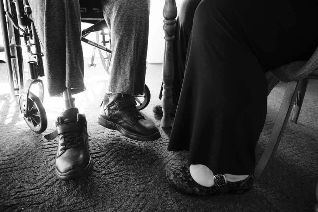 Third Place, Photographer of the Year - Large Market - Joshua A. Bickel / The Columbus DispatchNurse Beka Copley, right, listens as patient Robert Kipp, 80, left, of Chesapeake, Ohio, updates Copley on his health during a home visit on Wednesday, October 23, 2019 in Chesapeake, Ohio. Copley, originally from nearby Wayne County, West Virginia, knows that being from the area helps foster trust in her patients. “They see me as a familiar face. They hear my accent, and it’s a familiar sound,” she said.