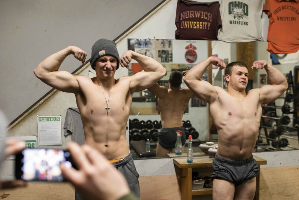 Third Place, Photographer of the Year - Large Market - Joshua A. Bickel / The Columbus DispatchAfter finishing their lifting session, Garrett, right, does bodybuilding poses with his trainer, Thomas Covert, left, as Dustin Myers takes a picture of the pair on Wednesday, February 27, 2019 at Old School Gym in Pataskala, Ohio. It was Garrett's last session with Thomas before heading to Abu Dhabi for the Special Olympics World Games.