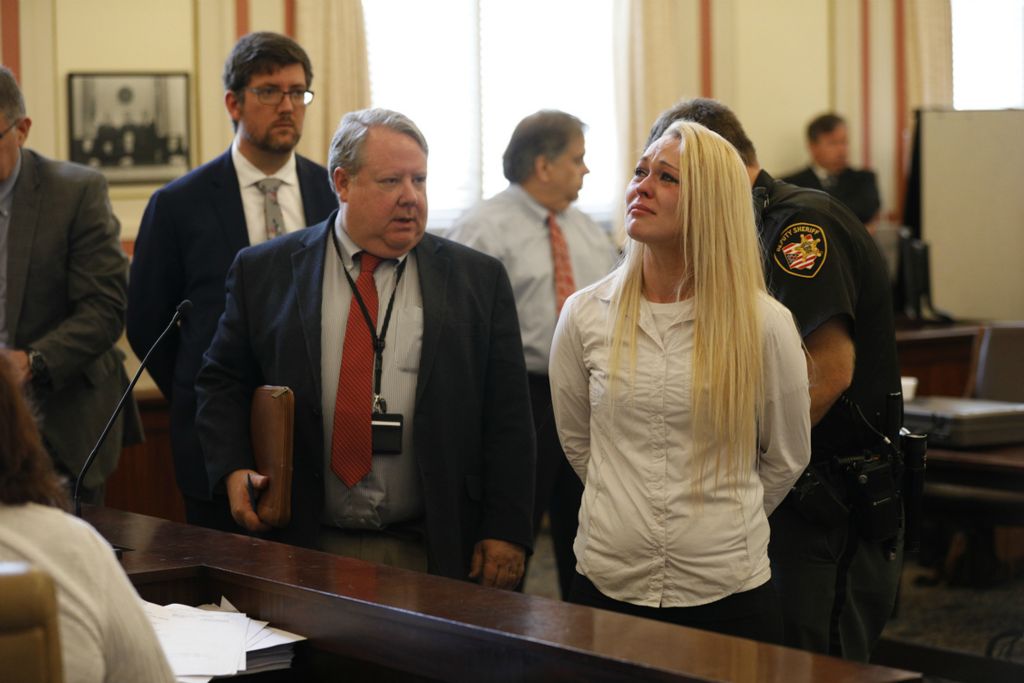 Award of Excellence, Photographer of the Year - Large Market - Albert Cesare / The Cincinnati EnquirerSamantha Davis reacts to her sentence of 8 years in prison on Wednesday, May 1, 2019, at the Hamilton County Courthouse in Cincinnati. Davis was found guilty in Hamilton County Common Please Court of two counts of aggravated vehicular homicide and drug possession charges. Davis was charged after losing control of the pickup she was driving, which continued over the concrete barrier and fell on a car below, killing the two passengers.
