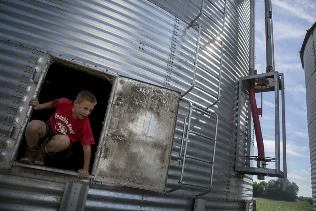 First place, Photographer of the Year - Small Market - Jessica Phelps / Newark AdvocateBryce Hollenback jumps out a silo on the family farm in July, 2018 looking for his next adventure. Growing up on a family farm in rural Ohio offers a freedom to the Hollenback boys while also instilling in them a sense of self pride and responsibility. They are always ready to help their parents out but love running around through the fields and climbing tress. Bryce's parents bought the farm before he was born and have built it up over the years hoping to leave a legacy for their children. 