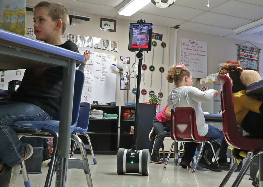 Second Place, Photographer of the Year - Small Market - Bill Lackey / Springfield News-SunThanks to a robot designed by the Ohio State University engineering department, Levi Suttles, 6, is still able to attend school at Miami View School in South Charleston despite battling leukemia. The robot allows Levi to move around and interact with his class from a computer at home. 