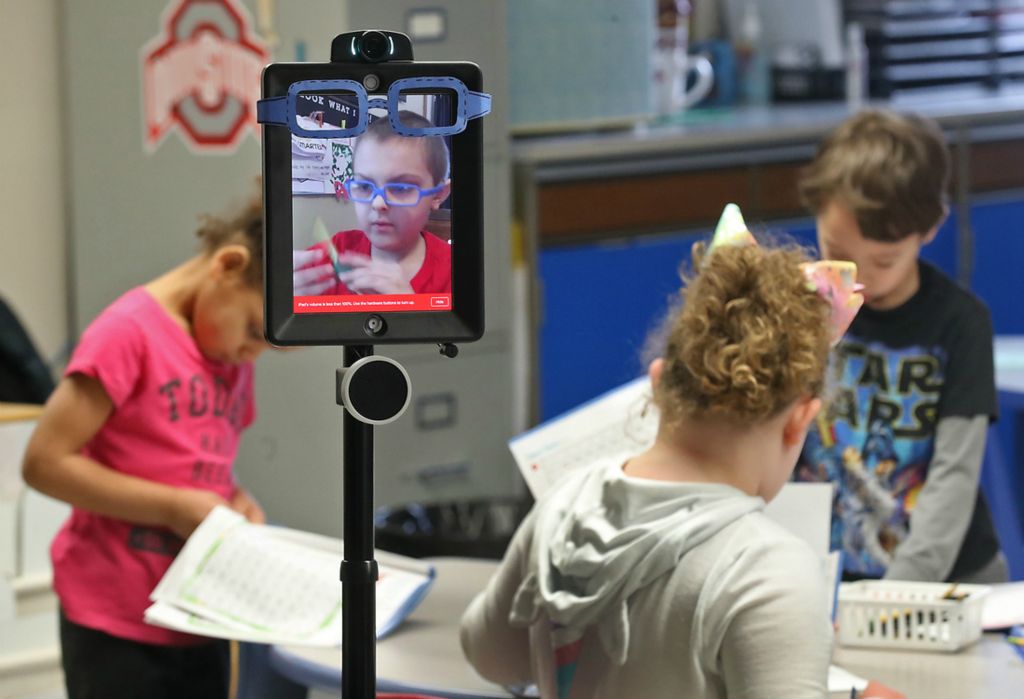 Second Place, Photographer of the Year - Small Market - Bill Lackey / Springfield News-SunThanks to a robot designed by the Ohio State University engineering department, Levi Suttles, 6, is still able to attend school at Miami View School in South Charleston despite battling leukemia. The robot allows Levi to move around and interact with his class from a computer at home. 