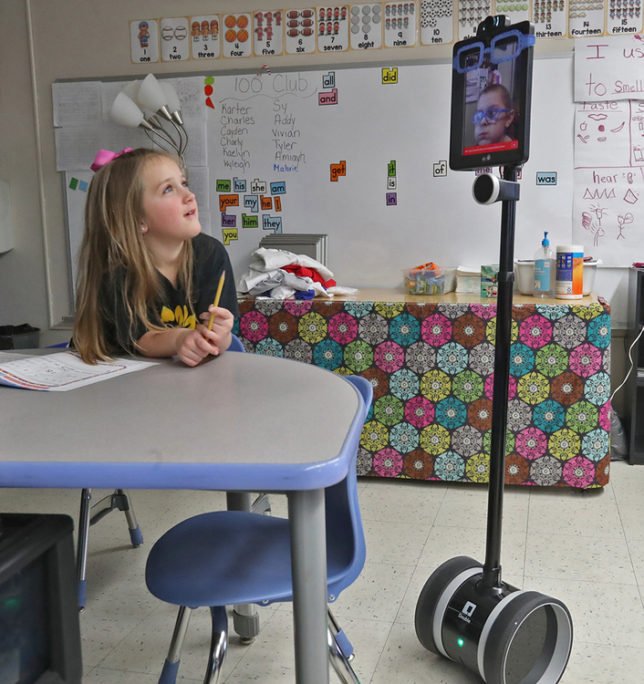 Second Place, Photographer of the Year - Small Market - Bill Lackey / Springfield News-SunThanks to a robot designed by the Ohio State University engineering department, Levi Suttles, 6, is still able to attend school at Miami View School in South Charleston despite battling leukemia. The robot allows Levi to move around and interact with his class from a computer at home. 