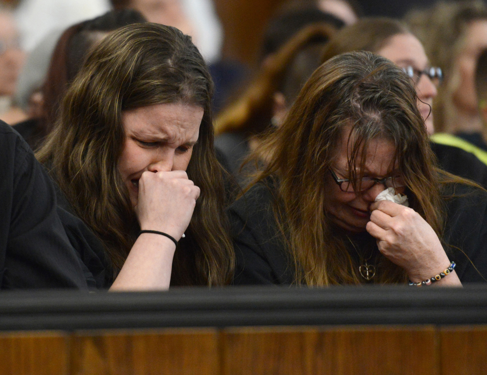 Third Place, Photographer of the Year - Small Market - Erin Caldwell / Sandusky RegisterFamily of Heather Bogle listen to Sandusky County Prosecutor Tim Braun as he goes through the details of Heather's murder during a hearing for Daniel Myers on Feb. 13, 2019, at the Sandusky County Courthouse in Fremont. Myers was sentenced to life in prison without parole for the murder of Heather Bogle.