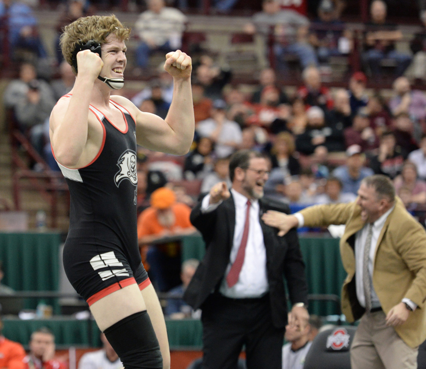 Third Place, Photographer of the Year - Small Market - Erin Caldwell / Sandusky RegisterPerkins' Lucas Salmon reacts to winning a state championship title as his coaches, Mike Salmon and Travis Crabtree, also celebrate during the Division II state wrestling finals in Columbus on March 9, 2019.