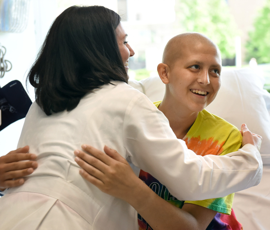 Third Place, Photographer of the Year - Small Market - Erin Caldwell / Sandusky RegisterOncologist Stacey Zahler hugs Cam after telling her the newest scans show no active cancer cells on June 7, 2019, at the Cleveland Clinic. “Before she came in I was really nervous to find out the result. But once she came in with a smile, it took all the worry away,” Cam said.