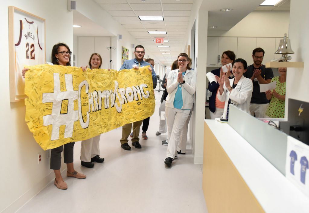 Third Place, Photographer of the Year - Small Market - Erin Caldwell / Sandusky RegisterDoctors and nurses cheer for Cam as she walks down the hall to ring the bell after her last chemotherapy treatment at the Cleveland Clinic children's building on July 22, 2019.