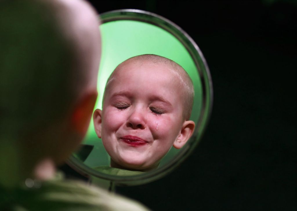 Third Place, Portrait Personality - Fred Squillante / Columbus Dispatch, “I Look Beautiful Bald”Norah Gruzs, 7, sheds tears after getting her head shaved at Fado Irish Pub to raise money for the St. Baldrick’s Foundation for research to help combat childhood cancers. Norah and her mom, Molly, raised $12,000 together. Molly Gruzs said it was all Norah’s idea to get involved in the head-shaving fundraiser, to remember a boy who had attended Norah’s preschool and died of cancer about five years ago. 