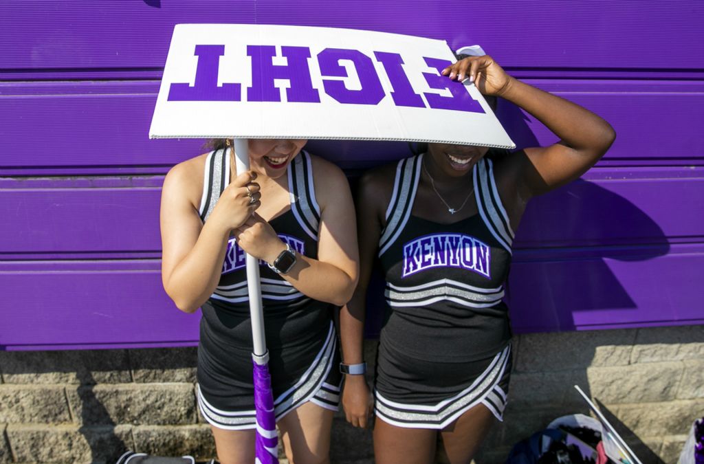 Award of Excellence, Sports Feature - Brooke LaValley / Freelance, “Kenyon Cheerleaders”Kenyon football cheerleaders Erika Abe (left) and Rhayven White shield their faces from the sun at McBride Field on the Kenyon College campus in Gambier, Ohio on September 28, 2019.