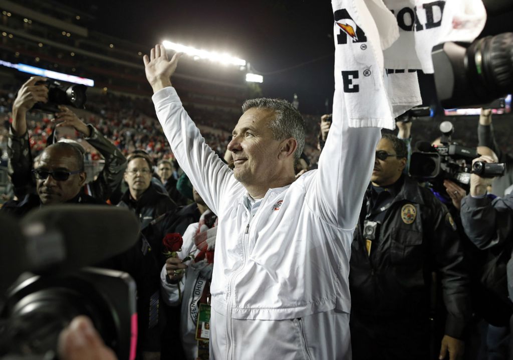 First Place, Ron Kuntz Sports Photographer of the Year - Kyle Robertson / The Columbus DispatchOhio State Buckeyes head coach Urban Meyer does the O-H chant as he walks off the field after beating Washington Huskies 28-23 in his last game as head coach in the 105th Rose Bowl in Pasadena, California on January 1, 2019. 