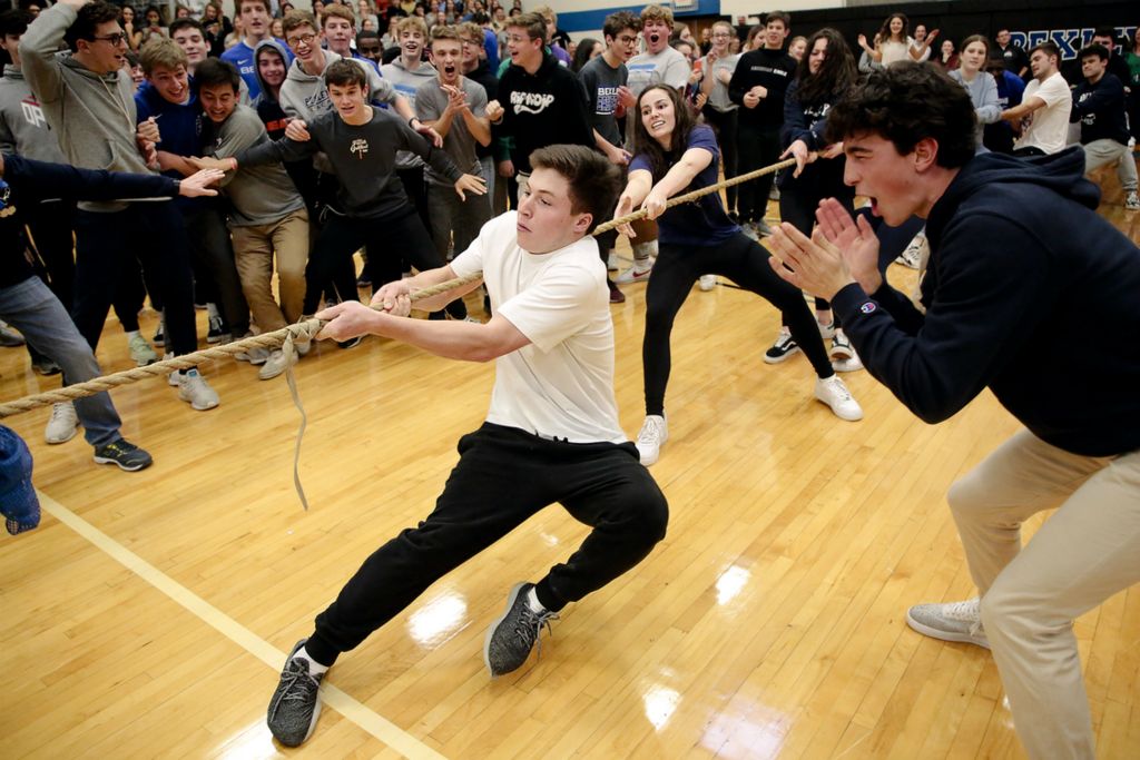 Second Place, Ron Kuntz Sports Photographer of the Year - Joshua A. Bickel / The Columbus DispatchWill Meyer, 16, a Bexley High School junior, pulls during the tug-of-war competition with the senior class during "Clash of Classes" on Tuesday, November 26, 2019 at Bexley High School in Bexley, Ohio. For many years, Bexley City Schools students have used the event to fundraise for the nonprofit Charity Newsies.