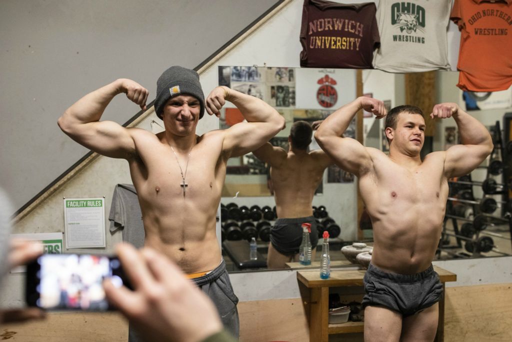Second Place, Ron Kuntz Sports Photographer of the Year - Joshua A. Bickel / The Columbus DispatchAfter finishing their lifting session, Garrett, right, does bodybuilding poses with his trainer, Thomas Covert, left, as Dustin Myers takes a picture of the pair on Wednesday, February 27, 2019 at Old School Gym in Pataskala, Ohio. It was Garrett's last session with Thomas before heading to Abu Dhabi for the Special Olympics World Games.