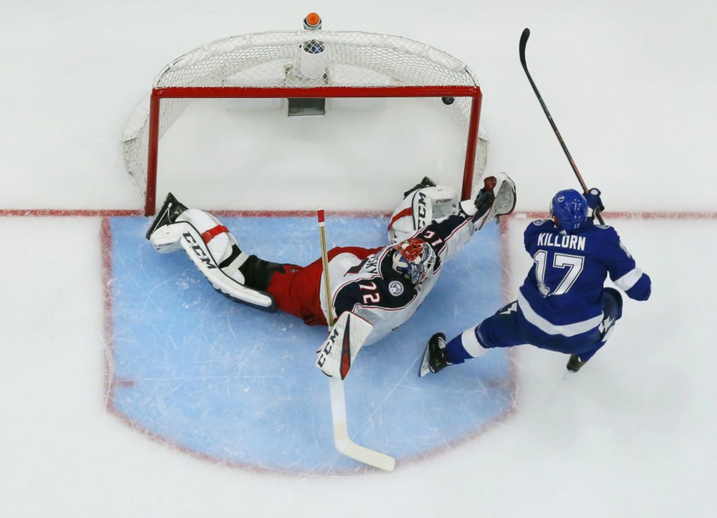 Third Place, Ron Kuntz Sports Photographer of the Year - Adam Cairns / The Columbus DispatchTampa Bay Lightning left wing Alex Killorn (17) scores a breakaway goal past Columbus Blue Jackets goaltender Sergei Bobrovsky (72) during the first period of the NHL Stanley Cup Playoffs first round series at Amalie Arena in Tampa, Florida on April 10, 2019. 