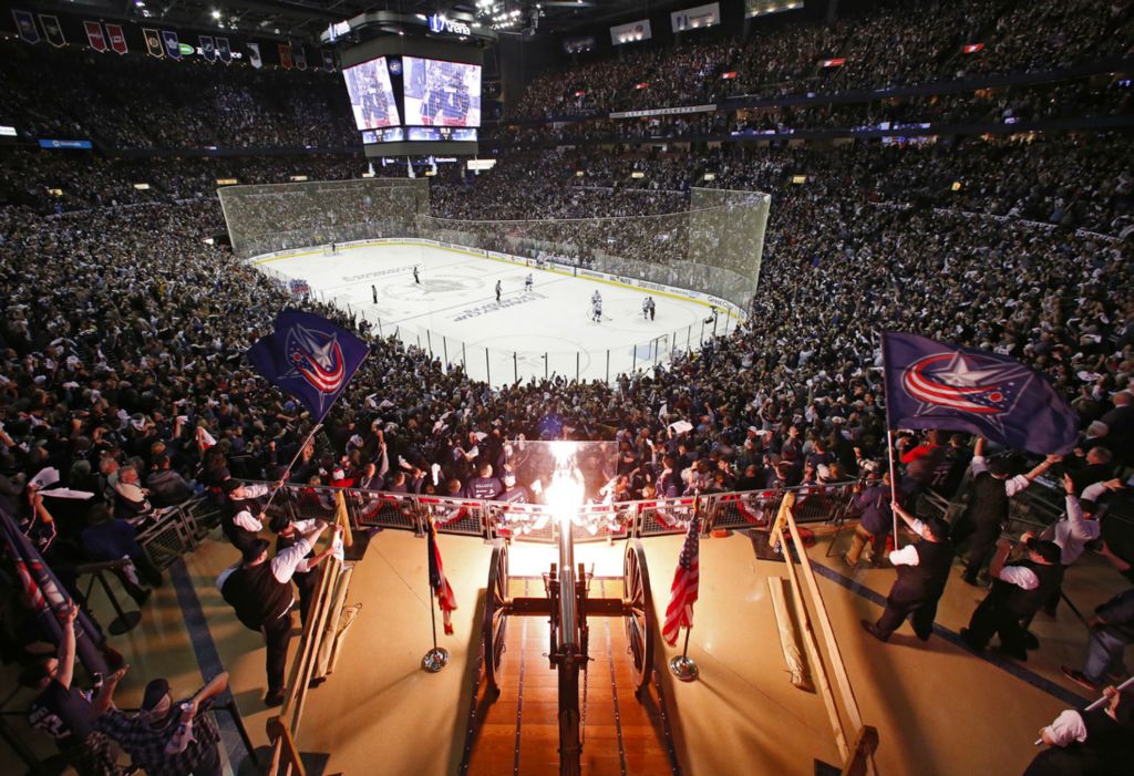 Third Place, Ron Kuntz Sports Photographer of the Year - Adam Cairns / The Columbus DispatchThe cannon fires to celebrate an empty-net goal by Columbus Blue Jackets right wing Cam Atkinson to  the 3-1 during the third period of the NHL Stanley Cup Playoffs Game 3 against the Tampa Bay Lightning at Nationwide Arena in Columbus on Sunday, April 14, 2019. The Blue Jackets took a 3-0 series lead with the 3-1 win. 