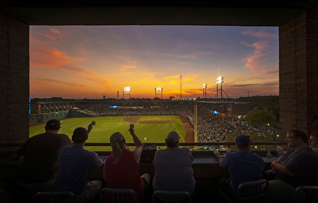 Third Place, Ron Kuntz Sports Photographer of the Year - Adam Cairns / The Columbus DispatchFans ring their bells from the seats in the upper left field balcony as the sun sets behind Huntington Park during the Clippers' final home game of the season in the Governor's Cup final against Durham on Sept. 11, 2019. 