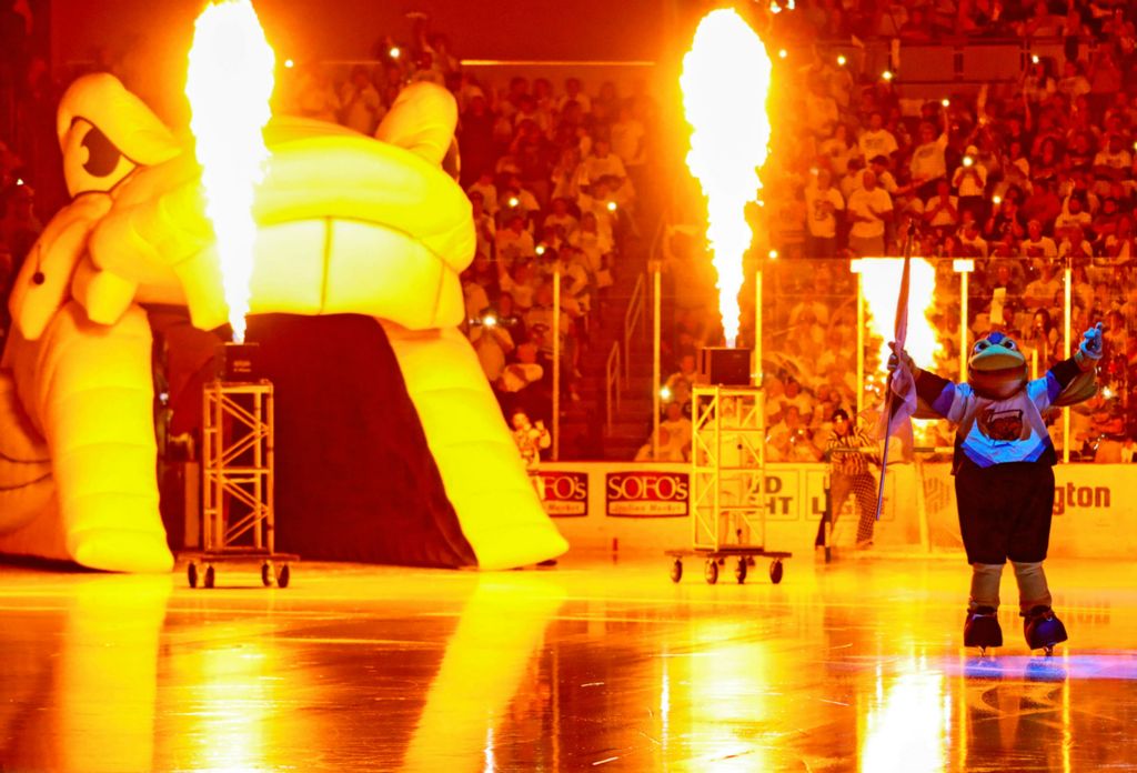 Award of Excellence, Ron Kuntz Sports Photographer of the Year - Kurt Steiss / The BladeSpike, the Toledo Walleye mascot, comes out to a fiery entrance ahead of the fourth game in the ECHL Kelly Cup finals series between the Toledo Walleye and the Newfoundland Growlers at the Huntington Center in Toledo on Friday, May 31, 2019.