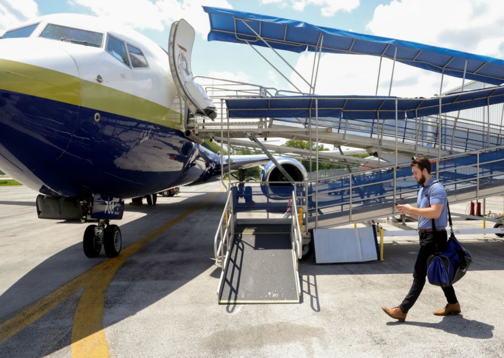 Award of Excellence, Ron Kuntz Sports Photographer of the Year - Kurt Steiss / The BladeWalleye forward Jordan Topping walks toward the ramp to board the chartered plane bound for Newfoundland at Toledo Express Airport in Swanton, Ohio, on Sunday, June 2, 2019.