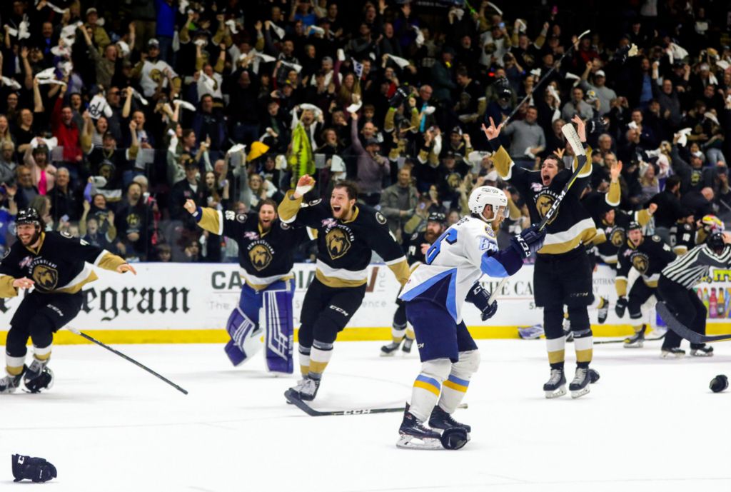 Award of Excellence, Ron Kuntz Sports Photographer of the Year - Kurt Steiss / The BladeToledo's Greg Wolfe (86) skates off after the Growlers win the Kelly Cup 4-3 in the Game 6 hockey game between the Toledo Walleye and Newfoundland Growlers at Mile One Centre in St. John's, Newfoundland and Labrador, Canada, on Tuesday, June 4, 2019. 