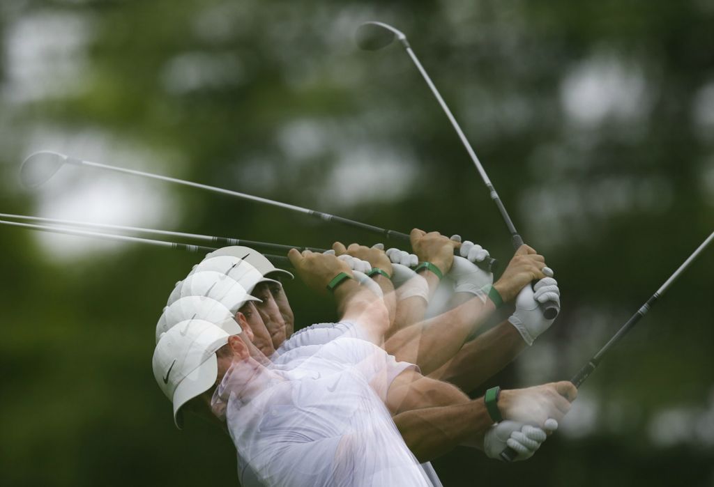First Place, Team Picture Story - Joshua A. Bickel / The Columbus Dispatch, “Memorial Golf Tournament”Using a multiple exposure technique, Rory McIlroy tees off on No. 3 during the first round of the Memorial Tournament on Thursday, May 30, 2019 at Muirfield Village Golf Club in Dublin. 