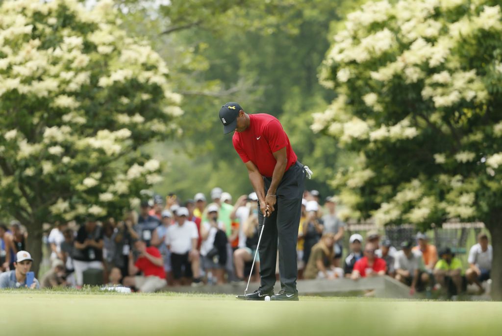 Second Place, Team Picture Story - Adam Cairns / The Columbus Dispatch, “Tiger”Tiger Woods putts on the 9th hole during the final round of the Memorial Tournament at Muirfield Village Golf Club in Dublin, June 2, 2019. 