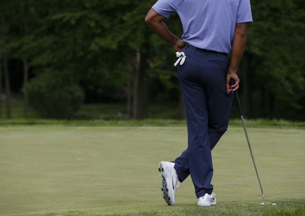 Second Place, Team Picture Story - Joshua A. Bickel / The Columbus Dispatch, “Tiger”Tiger Woods relaxes while waiting to putt on No. 8 during the first round of the Memorial Tournament on May 30, 2019 at Muirfield Village Golf Club in Dublin. 