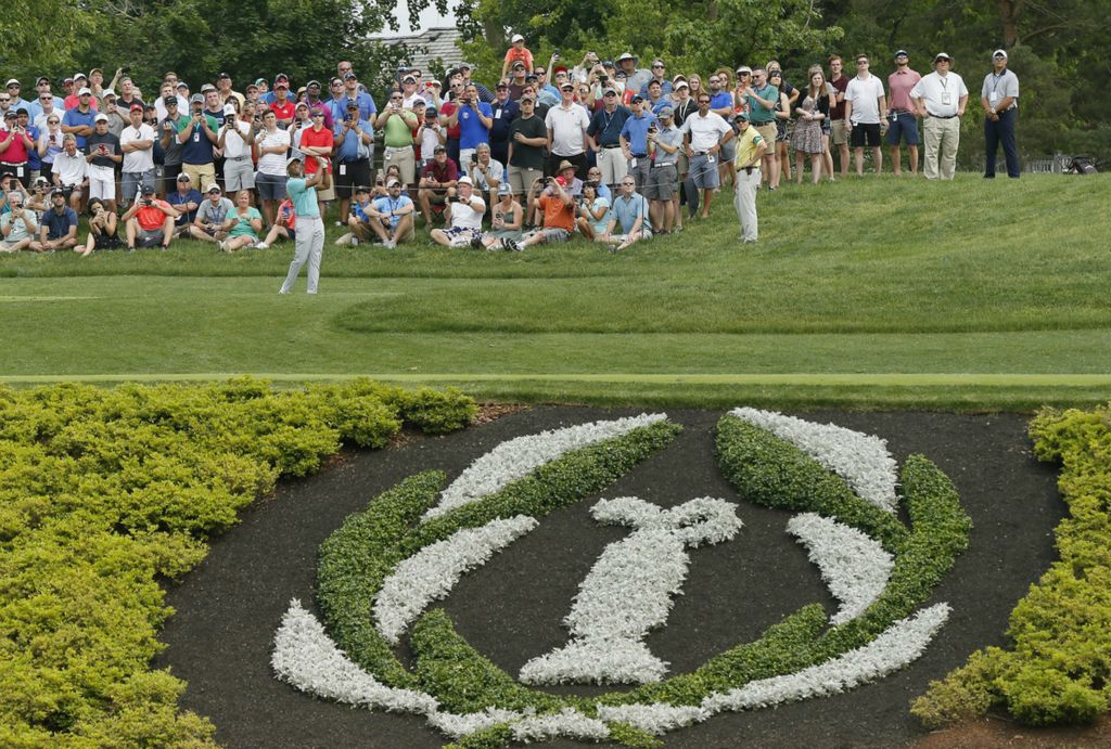 Second Place, Team Picture Story - Adam Cairns / The Columbus Dispatch, “Tiger”Tiger Woods tees off on the 12th hole during the second round of the Memorial Tournament at Muirfield Village Golf Club in Dublin, Ohio on May 31, 2019. 