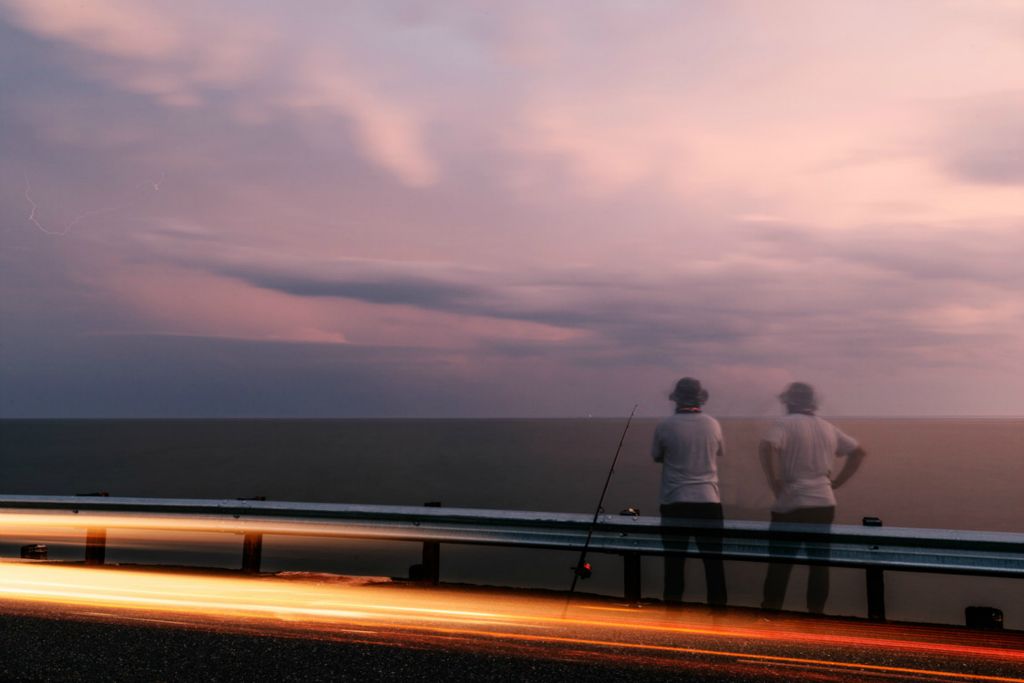 First Place, Chuck Scott Student Photographer of the Year - Carlin Stiehl / Ohio UniversityTravis Andrews casts, Washington D.C., out on Hoopers Island, Md. hoping to catch rockfish and trout on June 6, 2020. Tourists on hoopers Island. 