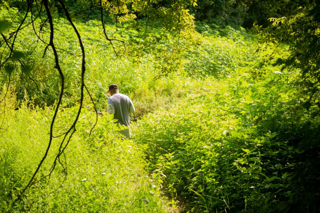 Second Place, Chuck Scott Student Photographer of the Year - Michael Blackshire / Ohio UniversityLarry Coffey walks deep into his backyard to a lake to go fishing for dinner on July 28, 2020. The Coffey family has lived in Duncan, Mississippi for over 40 years. 