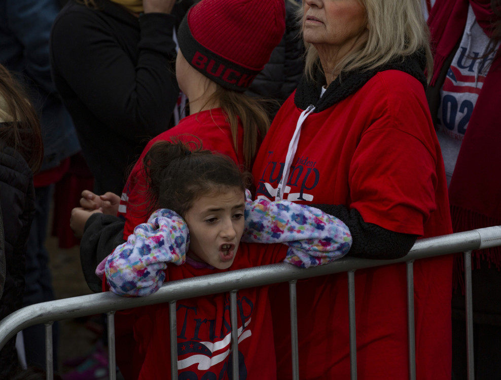 Second Place, Chuck Scott Student Photographer of the Year - Michael Blackshire / Ohio UniversityA child covers her ears from the loud noise of cheer during President Donald J. Trump’s campaign rally in Circleville, Ohio on October 24, 2020. A outside gathering of several thousand chanted “four more years” as President Trump walked out to Creedence Clearwater Revival song ‘Fortunate Son’ before giving an hour and a half speech. 