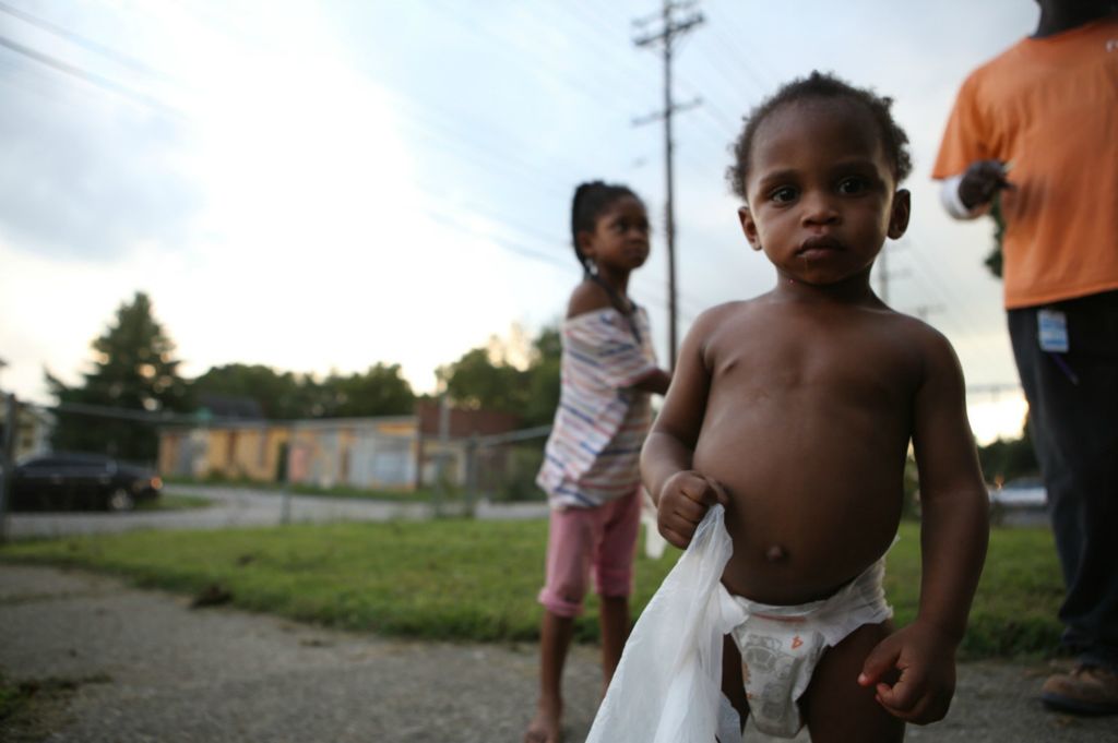 Second Place, Chuck Scott Student Photographer of the Year - Michael Blackshire / Ohio UniversityWilliam Boyle Bowdre, 2, looks inside the camera as he walks around the outside of his families house in the Shawnee neighborhood in Louisville on September 2, 2020. 