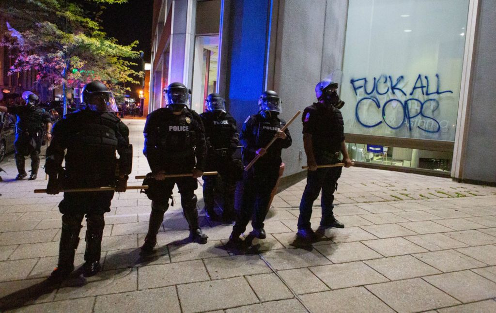 Second Place, Chuck Scott Student Photographer of the Year - Michael Blackshire / Ohio UniversityLouisville Police guard a street in downtown Louisville on May 29th, 2020. Police would soon throw tear gas into the crowds to disperse the protestors.