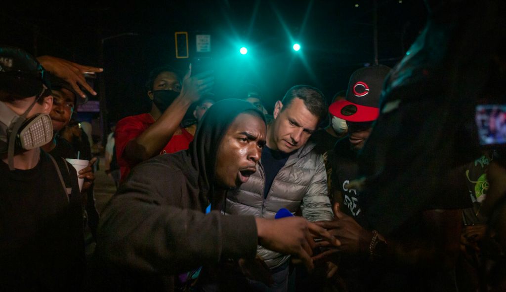 Second Place, Chuck Scott Student Photographer of the Year - Michael Blackshire / Ohio UniversityProtestors do an interview with a French news station two nights after the death of Rayshard Brooks. “All of us out here. You want to throw us up under the jail. You want to shoot somebody ‘cause they went to sleep. What if we run up on your ass and shoot your ass? Y’all going to keep shooting us? Fuck looting, we going to just start straight shooting,” one of the protestors said.