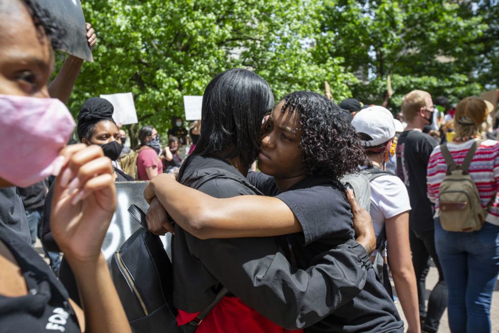 Third Place, Chuck Scott Student Photographer of the Year - Lauren Santucci / Ohio UniversityKyah Hairston, 14, of Columbus, Ohio hugs her mother, Becky Hairston, at a peaceful protest in the wake of George Floyd's death in downtown Columbus, Ohio on June 1, 2020. 