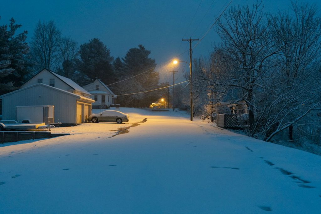 Third Place, Chuck Scott Student Photographer of the Year - Lauren Santucci / Ohio UniversityThe center of Chesterhill is quiet, with family homes that appear close together compared to the farmhouses on hilly backroads. The village’s small population of 270 has slowly diminished over generations as jobs, schools, and other community resources disappeared. 