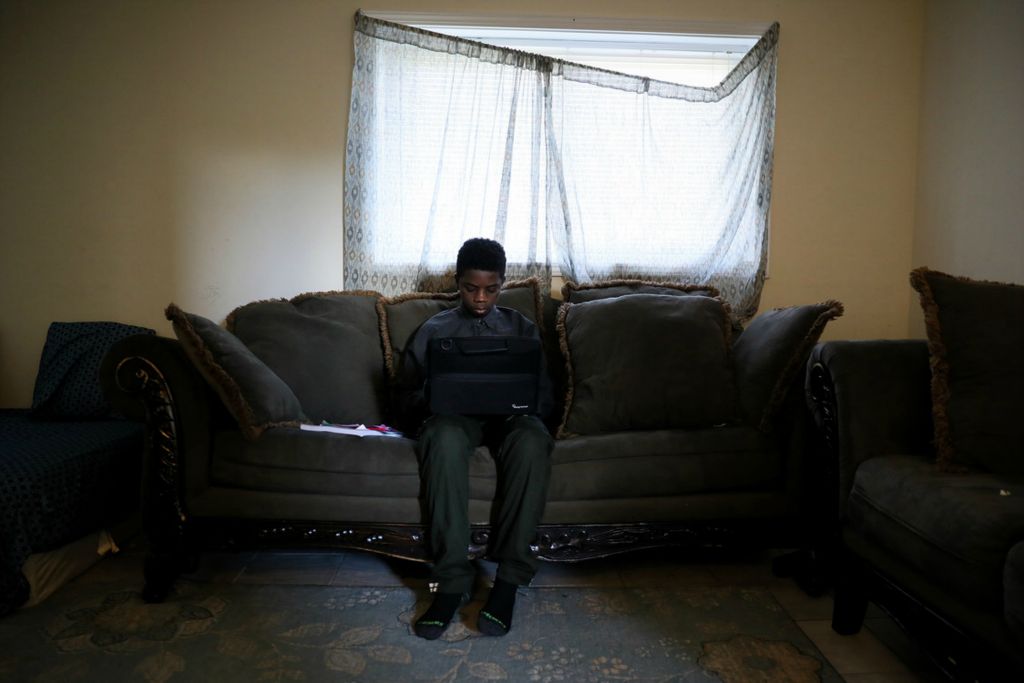 Award of Excellence, General News - Kareem Elgazzar / The Cincinnati Enquirer, “Day of Distance Learning”Tene Ba, 13, a seventh-grade student at Winton Woods Middle School, reviews his English lessons, April 2, 2020, in Forest Park, Ohio. Tene was born in Baltimore, Maryland, but spent five years in Mauritania where he learned French as his first language. An English Language Learner, Ba faces barriers trying to keep up with daily assignments.