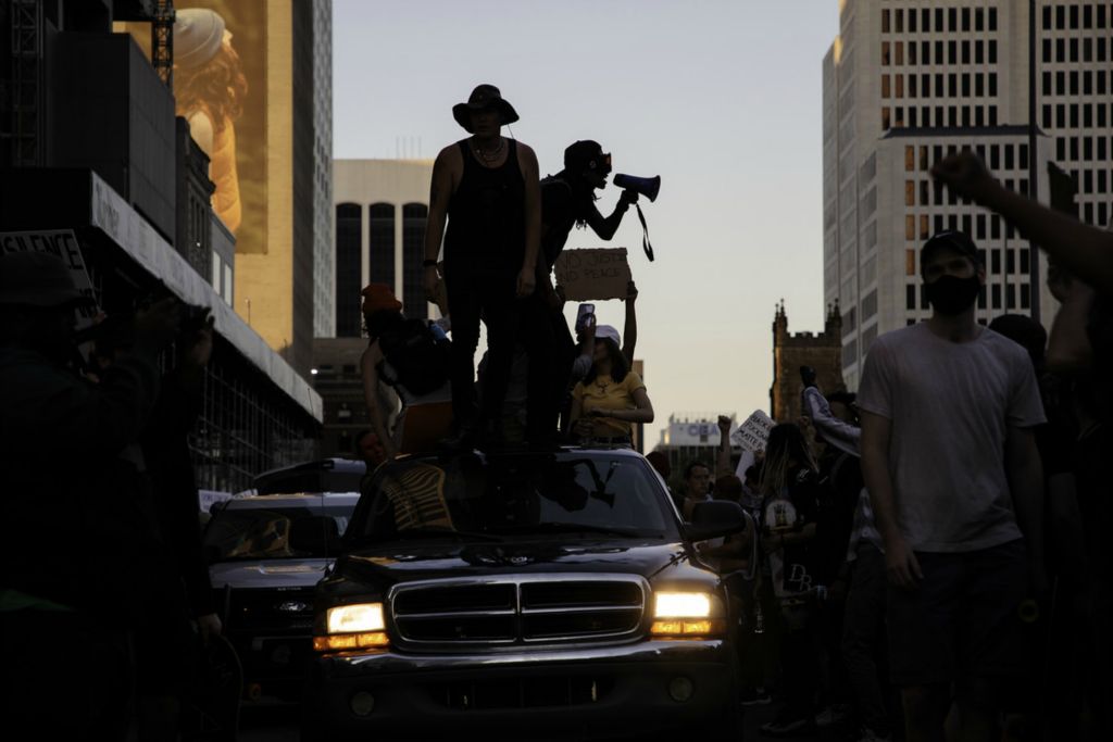 Second Place, News Picture Story - Joshua A. Bickel / The Columbus Dispatch, “George Floyd Protests”A protester leads a chant as they stand on a car in Broad Street as protests continue following the death of Minneapolis resident George Floyd on Tuesday, June 2, 2020 in Columbus, Ohio.