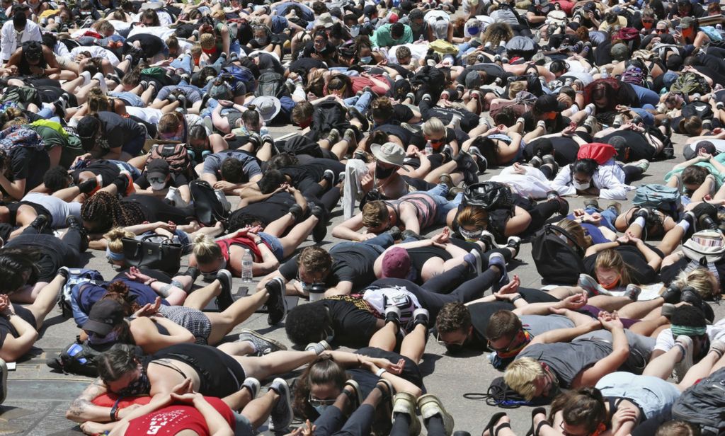 First Place, James R. Gordon Ohio Understanding Award - Eric Albrecht / The Columbus Dispatch, “Political Climate of Southeast Ohio”Demonstrators lie on the ground for eight minutes and forty-six seconds, the amount of time that George Floyd was pinned to the ground by a Minneapolis police officer before his death, during a  protest in front of the Statehouse June 6, 2020.