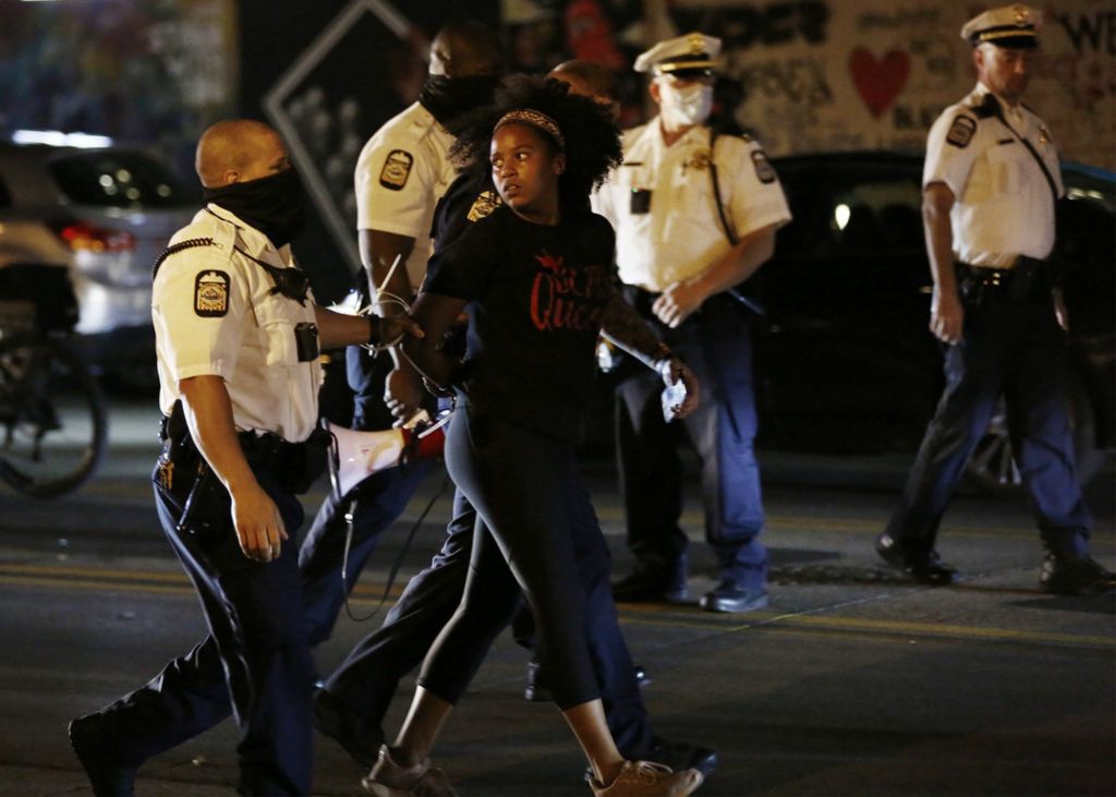 First Place, James R. Gordon Ohio Understanding Award - Fred Squillante / The Columbus Dispatch, “Political Climate of Southeast Ohio”Black Lives Matter protesters blocked the northbound lanes of S. High St. in front of the Ohio Statehouse during a protest on Friday, July 31, 2020. Several protesters were arrested, including Sierra Mason of Canton.