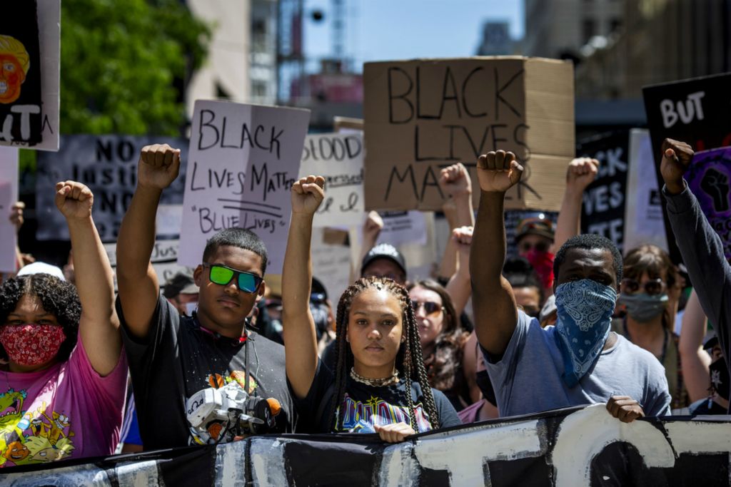 First Place, George S. Smallsreed Jr. Photographer of the Year - Large Market - Meg Vogel / The Cincinnati EnquirerThousands of protesters prepare to march on Vine Street in downtown Cincinnati on Sunday, June 7, 2020. This is the tenth day of protests in response to the death of George Floyd in Minneapolis.