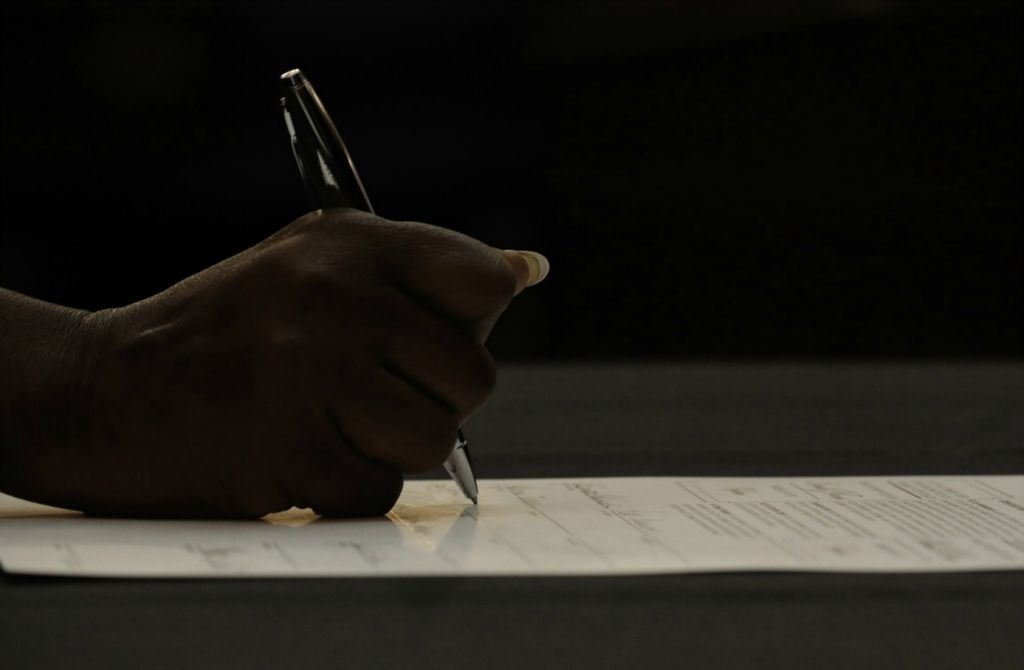 Second Place, George S. Smallsreed Jr. Photographer of the Year - Large Market - Joshua A. Bickel / The Columbus DispatchOhio Elector Barbara Clark signs the official Certificate of Votes certifying Ohio’s 18 electoral votes for President Donald J. Trump during the 55th Electoral College on Monday, Dec. 14, 2020 at the Ohio Statehouse in Columbus, Ohio. Ohio’s 18 electors cast their votes for President Donald J. Trump, who won the popular vote in Ohio but lost the overall Electoral College and national popular vote to President-elect Joseph R. Biden Jr.