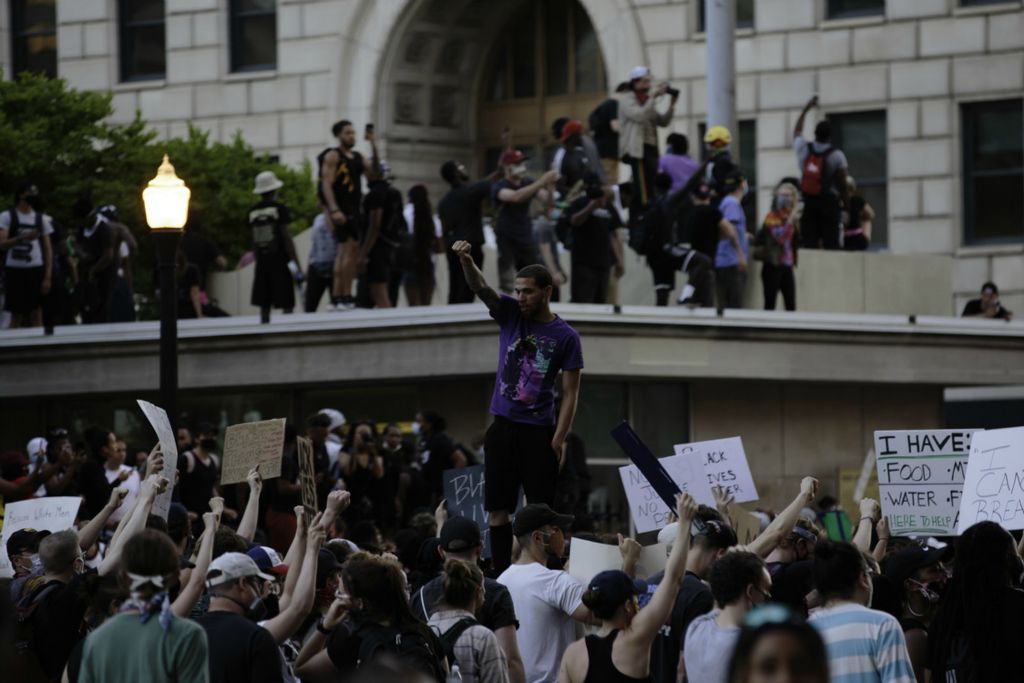 Second Place, George S. Smallsreed Jr. Photographer of the Year - Large Market - Joshua A. Bickel / The Columbus DispatchProtesters march back into the intersection of High and Broad street as protests continue following the death of Minneapolis resident George Floyd on Tuesday, June 2, 2020 in Columbus, Ohio.