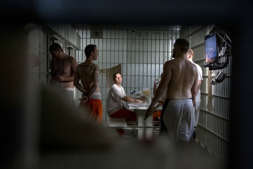 First Place, George S. Smallsreed Jr. Photographer of the Year - Small Market - Jessica Phelps / Newark AdvocateInmates in cell block B at the Coshocton County Justice Center pass the time watching TV and talking January 14, 2020. The more violent offenders, usually awaiting trial, are placed in the two cell blocks while low level offenders are in more open areas. 