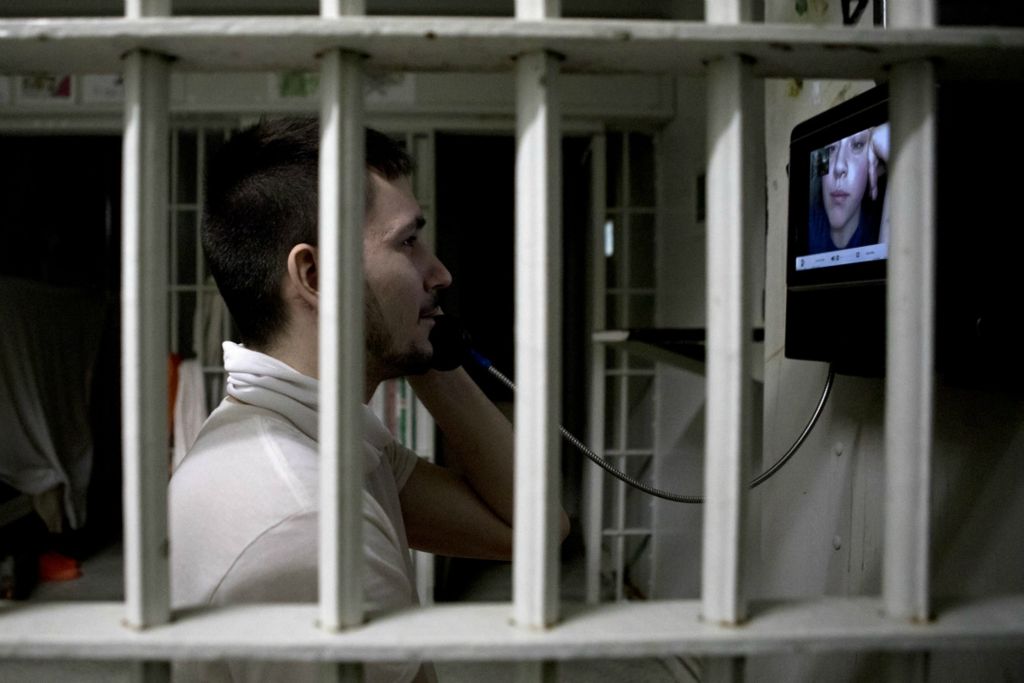 First Place, George S. Smallsreed Jr. Photographer of the Year - Small Market - Jessica Phelps / Newark AdvocateDallas Wood speaks with his girlfriend, Justice Dawson while in cell block A at the Coschoton County Justice Center November 18, 2020. The Justice Center has added video cameras that allow inmates to see their loved ones while in jail during the pandemic and in person visits are not allowed. 